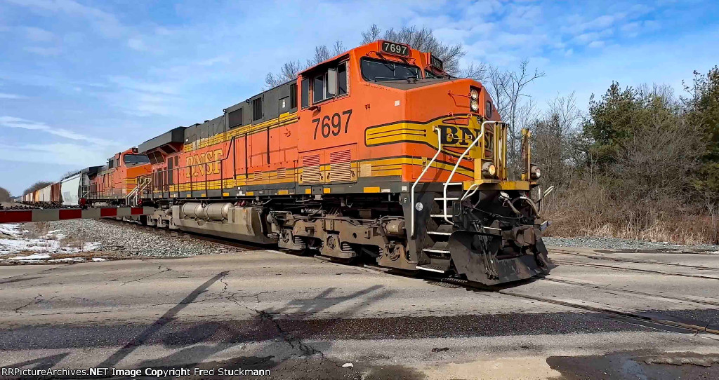 BNSF 7697 leads M370 across Diamond St.